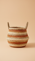 Artisanal woven storage basket in terracotta